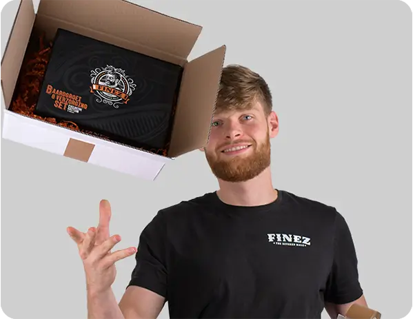 Mede-oprichter van Finez die een doos met een baardgroeikit erin de lucht in gooit.